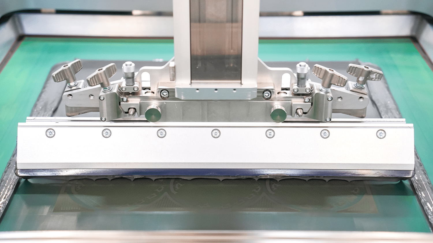 Squeege Applies Printing Past To A Screen